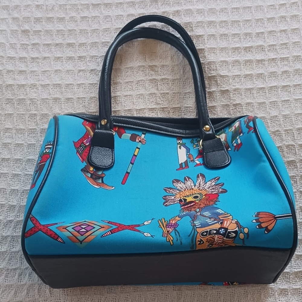 Never used Blue cloth purse featuring Native American dancers